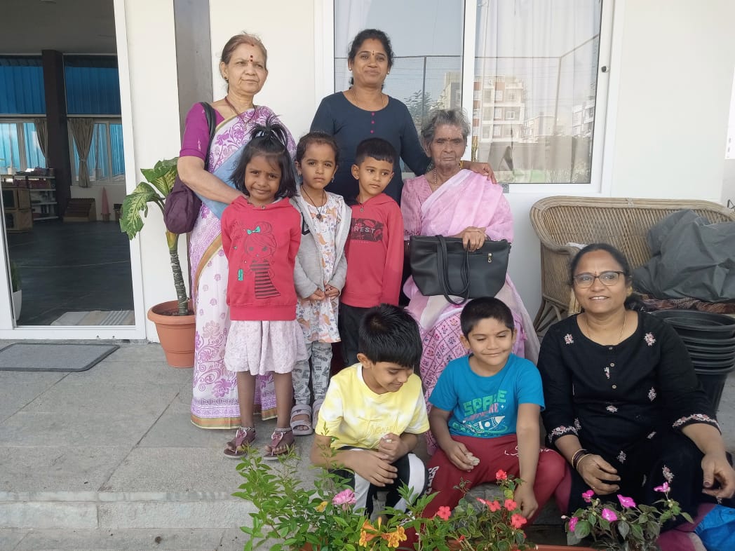Family day at home — children, mothers and grandmothers
