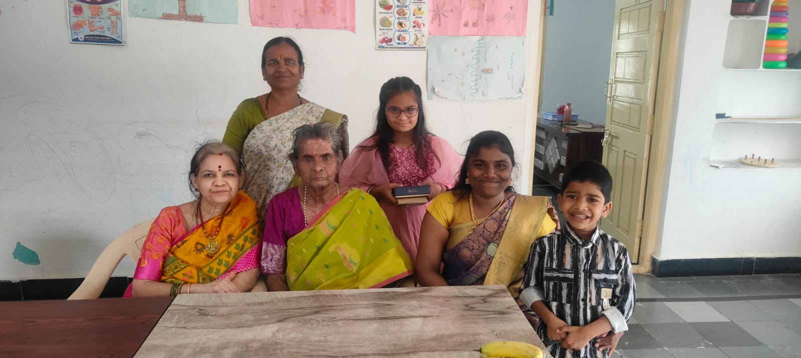 Family visit at the special school — trustees with a family