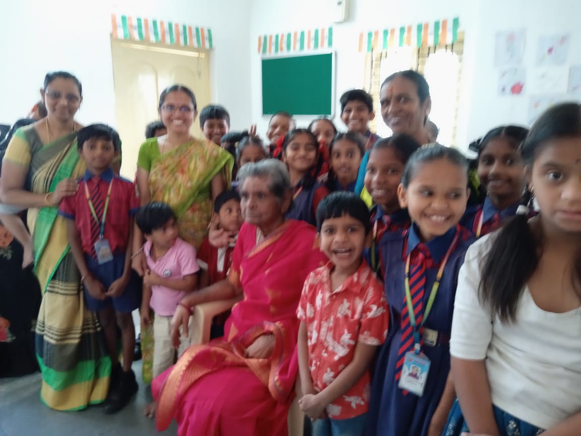 SRDT trustees with students during a school visit