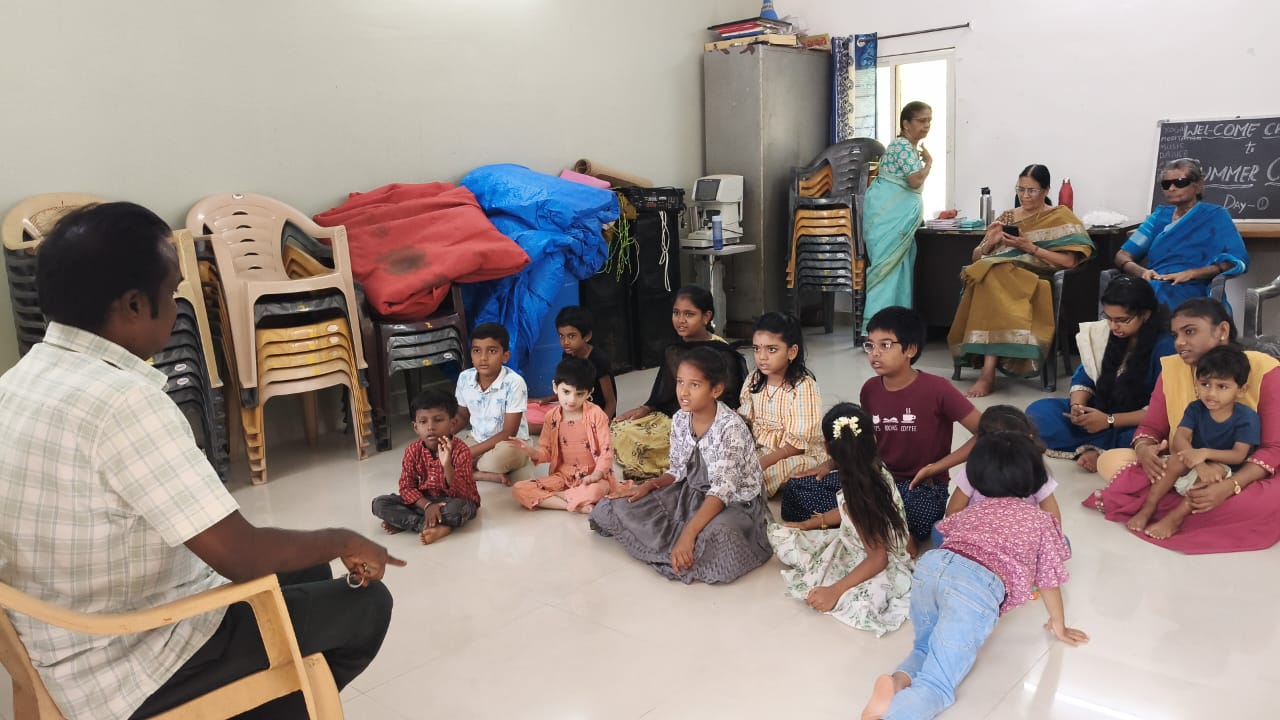 Summer camp Day 1 — children seated for a session